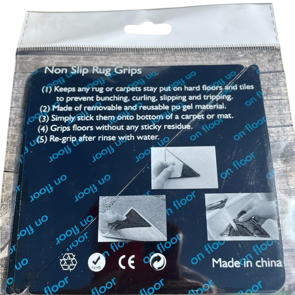 Lot of 3 packages of nonslip Rug Grips-1 grip per corner of rug. New in package.